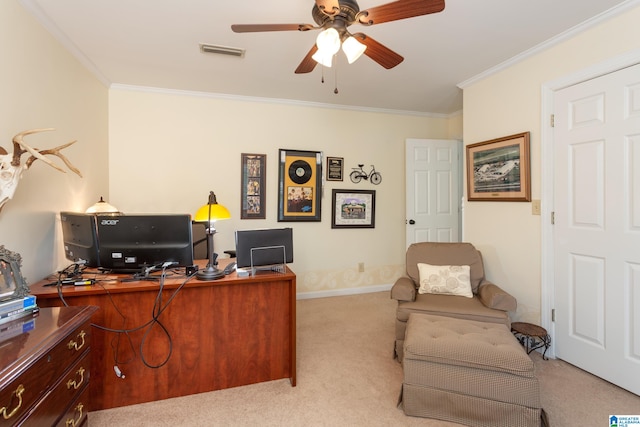 office area featuring ornamental molding, ceiling fan, and light colored carpet