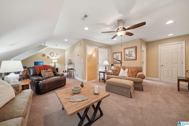 carpeted living room featuring ceiling fan