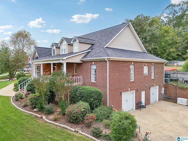 view of side of property with a garage