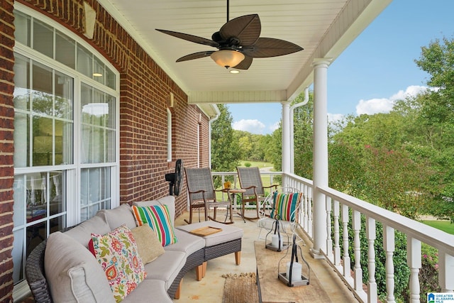 balcony featuring outdoor lounge area and ceiling fan