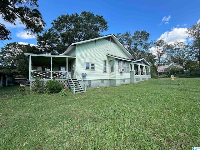 view of home's exterior with a lawn and cooling unit