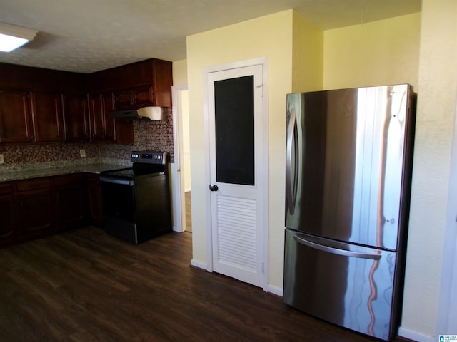 kitchen featuring freestanding refrigerator, dark wood-type flooring, under cabinet range hood, black electric range oven, and backsplash