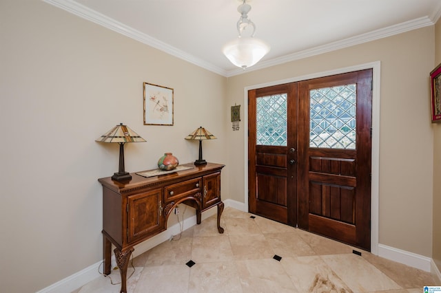 tiled entryway featuring ornamental molding and french doors