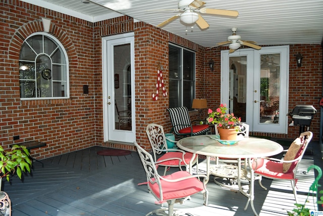 exterior space featuring ceiling fan