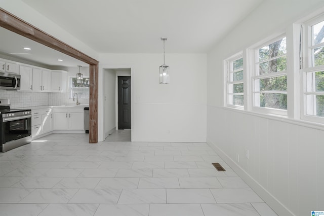 dining space with sink