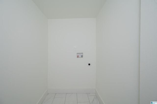 washroom featuring washer hookup, hookup for an electric dryer, and light tile patterned flooring