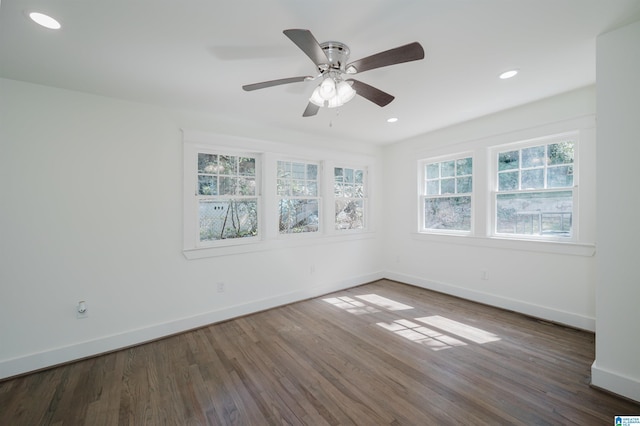 empty room with recessed lighting, baseboards, a ceiling fan, and wood finished floors