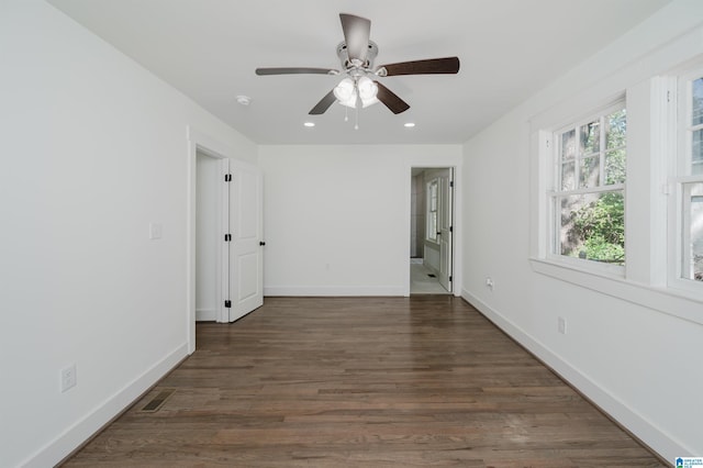 unfurnished room featuring recessed lighting, baseboards, a ceiling fan, and wood finished floors