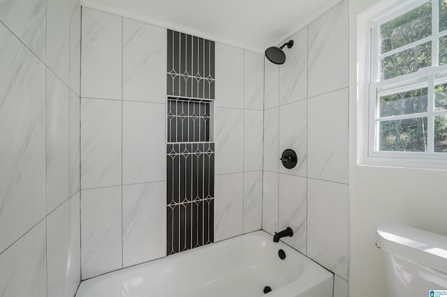 full bathroom featuring bathtub / shower combination and toilet