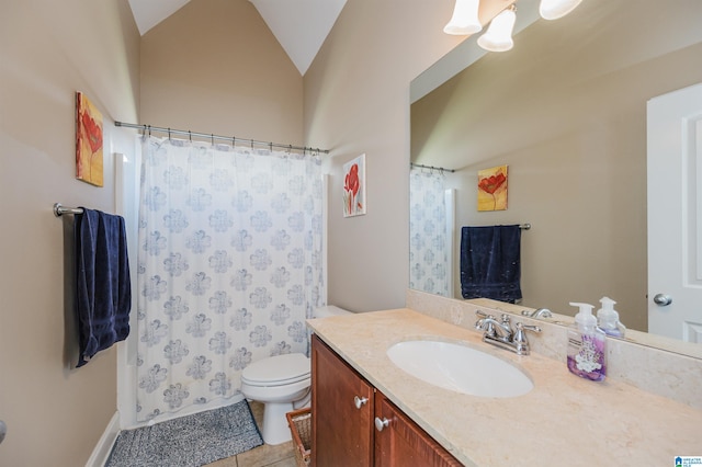 bathroom with vanity, toilet, tile patterned floors, and lofted ceiling