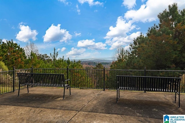 view of patio / terrace with a mountain view