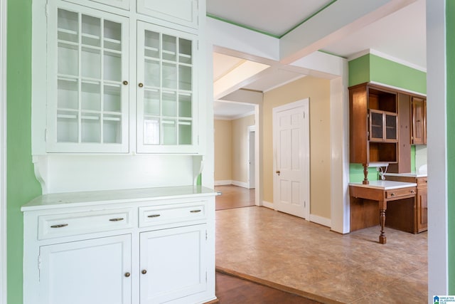 305 S St E, Talladega, AL 35160 - hallway featuring baseboards and ornamental molding