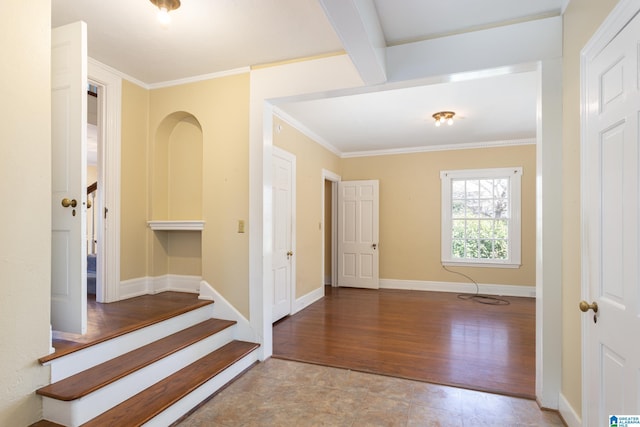 305 S St E, Talladega, AL 35160 - foyer with wood finished floors, baseboards, ornamental molding, and stairway