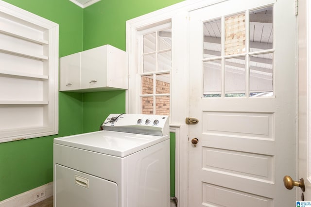 laundry room with washer / clothes dryer and cabinets