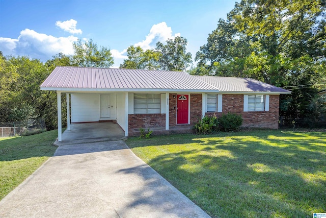 ranch-style home featuring a carport and a front lawn