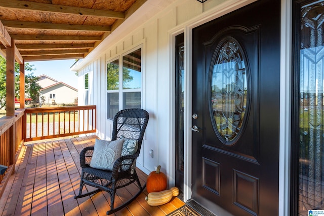 entrance to property with a deck