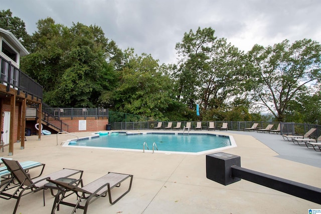 view of pool with a patio area