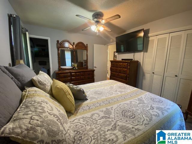 bedroom with a closet and ceiling fan