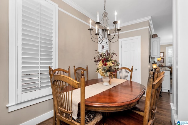 dining area with crown molding, dark wood-type flooring, and a notable chandelier