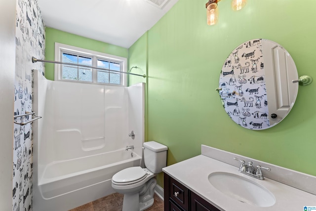 full bathroom featuring washtub / shower combination, vanity, toilet, and tile patterned floors