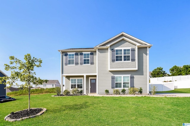 view of front of property with a front lawn