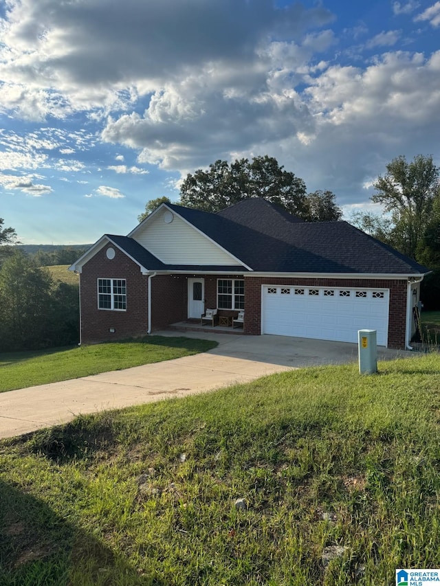 ranch-style home with a front lawn and a garage