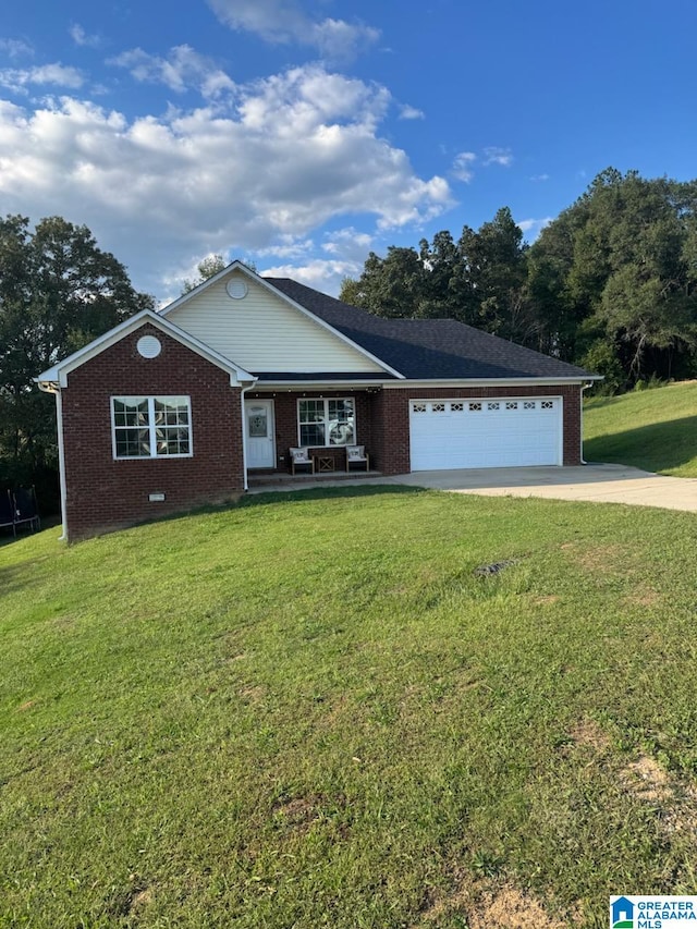 ranch-style house with a garage and a front lawn