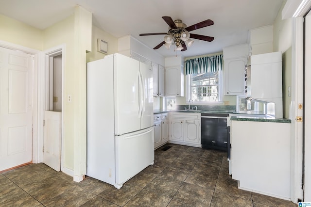 kitchen with ceiling fan, sink, white refrigerator, white cabinetry, and dishwasher