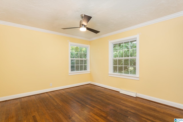 unfurnished room featuring ceiling fan, dark hardwood / wood-style floors, a healthy amount of sunlight, and crown molding