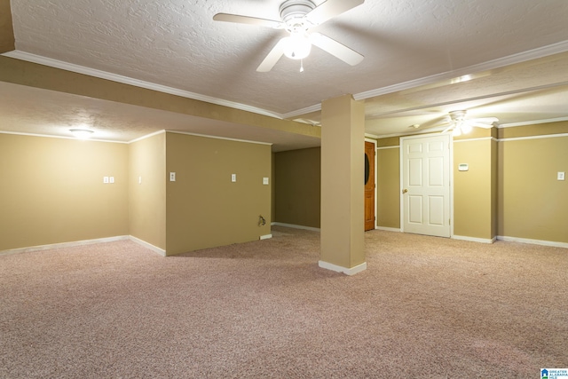 basement featuring a textured ceiling, carpet floors, and crown molding