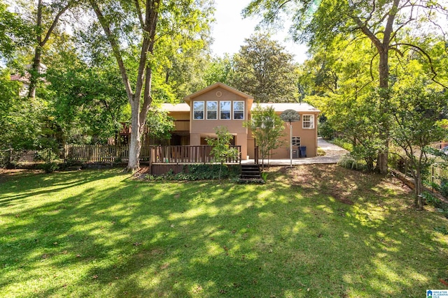 view of yard featuring a wooden deck