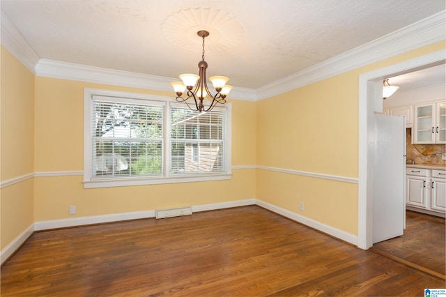 unfurnished dining area with ornamental molding, a chandelier, and dark hardwood / wood-style flooring