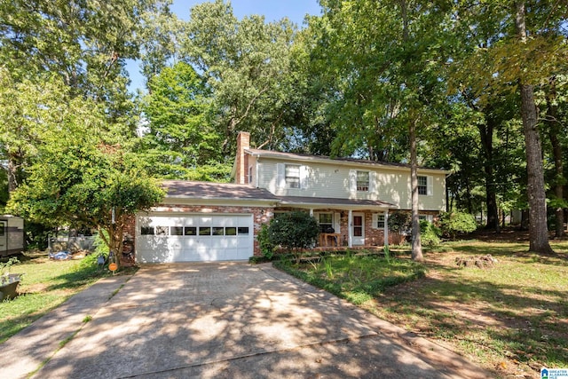 view of property featuring a garage and a porch