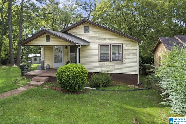 bungalow with a front lawn