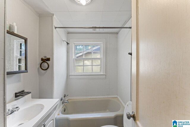 bathroom with vanity and  shower combination