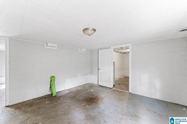 interior space featuring concrete flooring