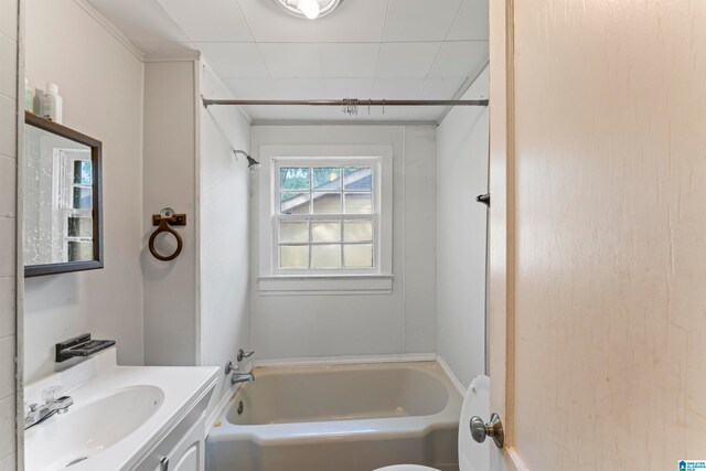 bathroom featuring vanity and  shower combination