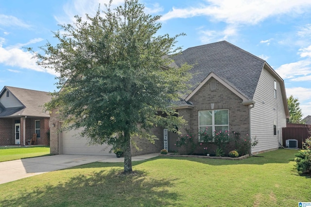 view of front of home with central AC and a front yard