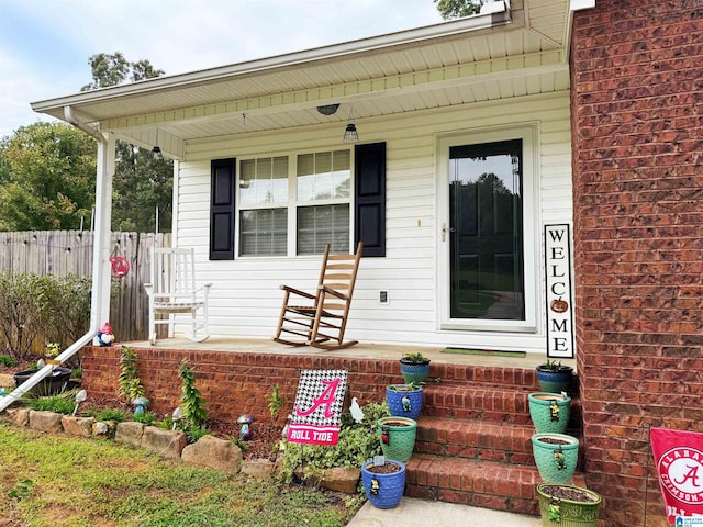 property entrance featuring covered porch