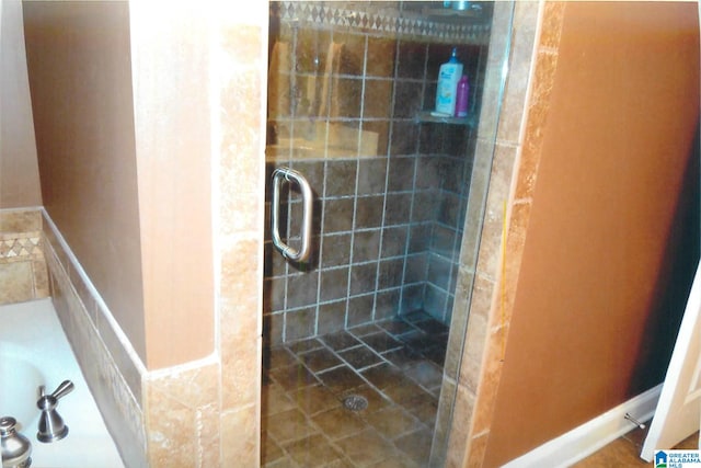 bathroom featuring walk in shower