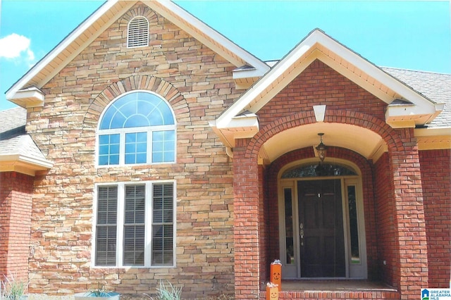 property entrance featuring central AC