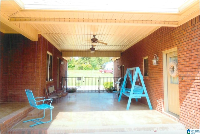 view of patio / terrace featuring ceiling fan