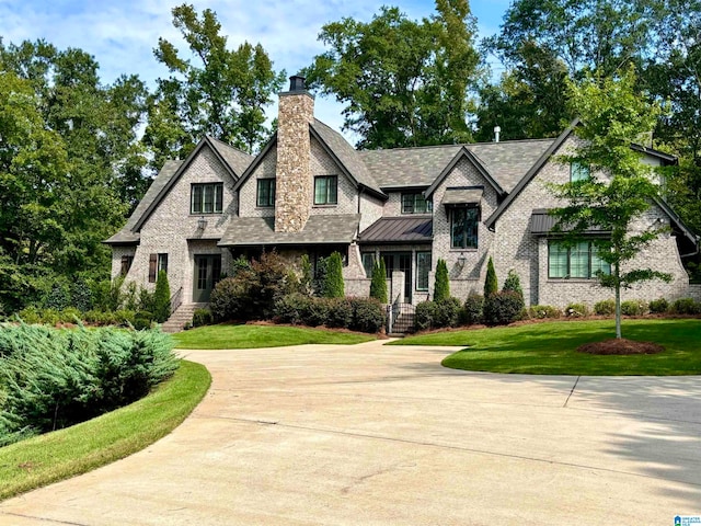 view of front of home with a front yard