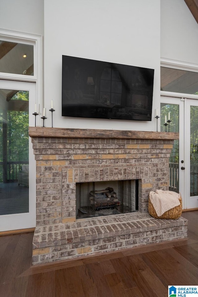 room details with a fireplace and hardwood / wood-style floors