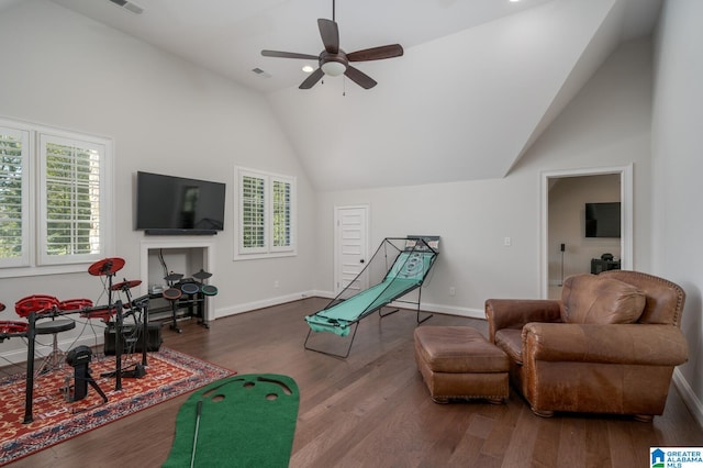 living room with hardwood / wood-style floors, ceiling fan, and a healthy amount of sunlight