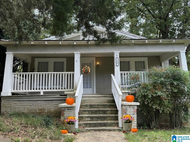 bungalow-style house featuring covered porch