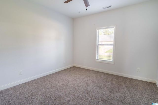 carpeted empty room with ceiling fan