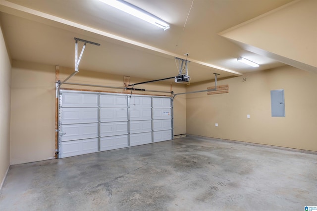 garage featuring a garage door opener and electric panel