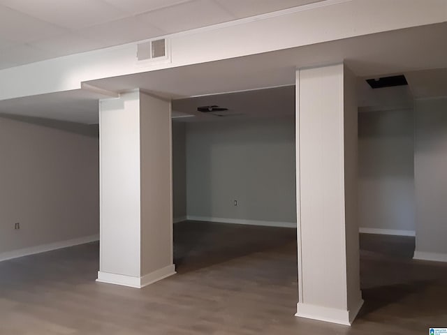 basement featuring wood-type flooring