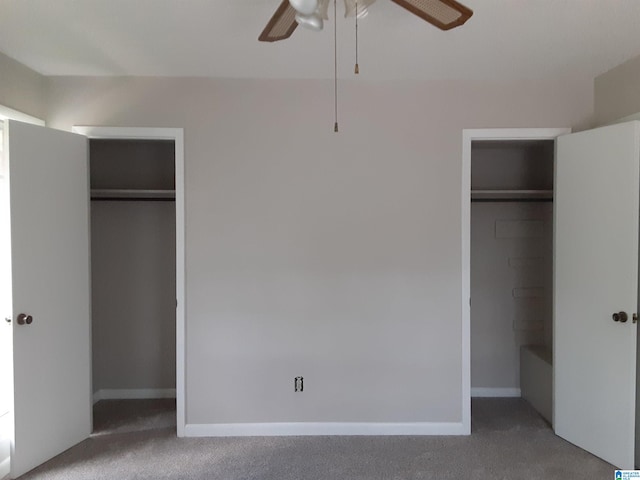 unfurnished bedroom featuring carpet floors and ceiling fan